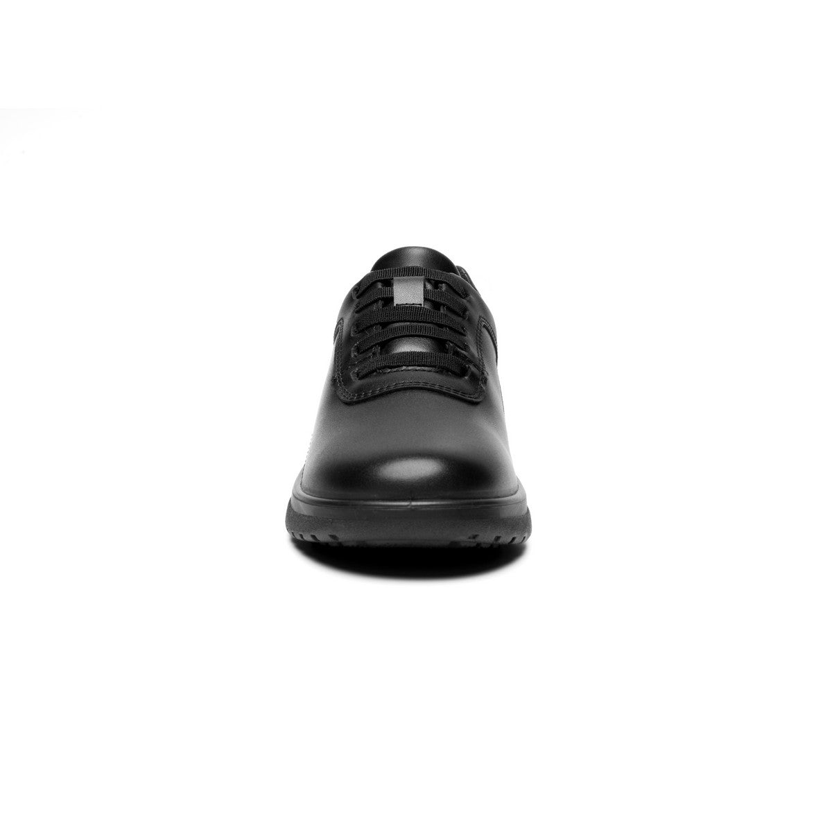 Vista lateral de tenis urbano negro mate para mujer