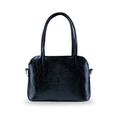 Bolsa estructurada negra con anillos laterales para correa cruzada
