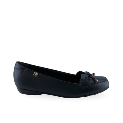 Mocasín de mujer negro texturizado con moño decorativo y detalle dorado